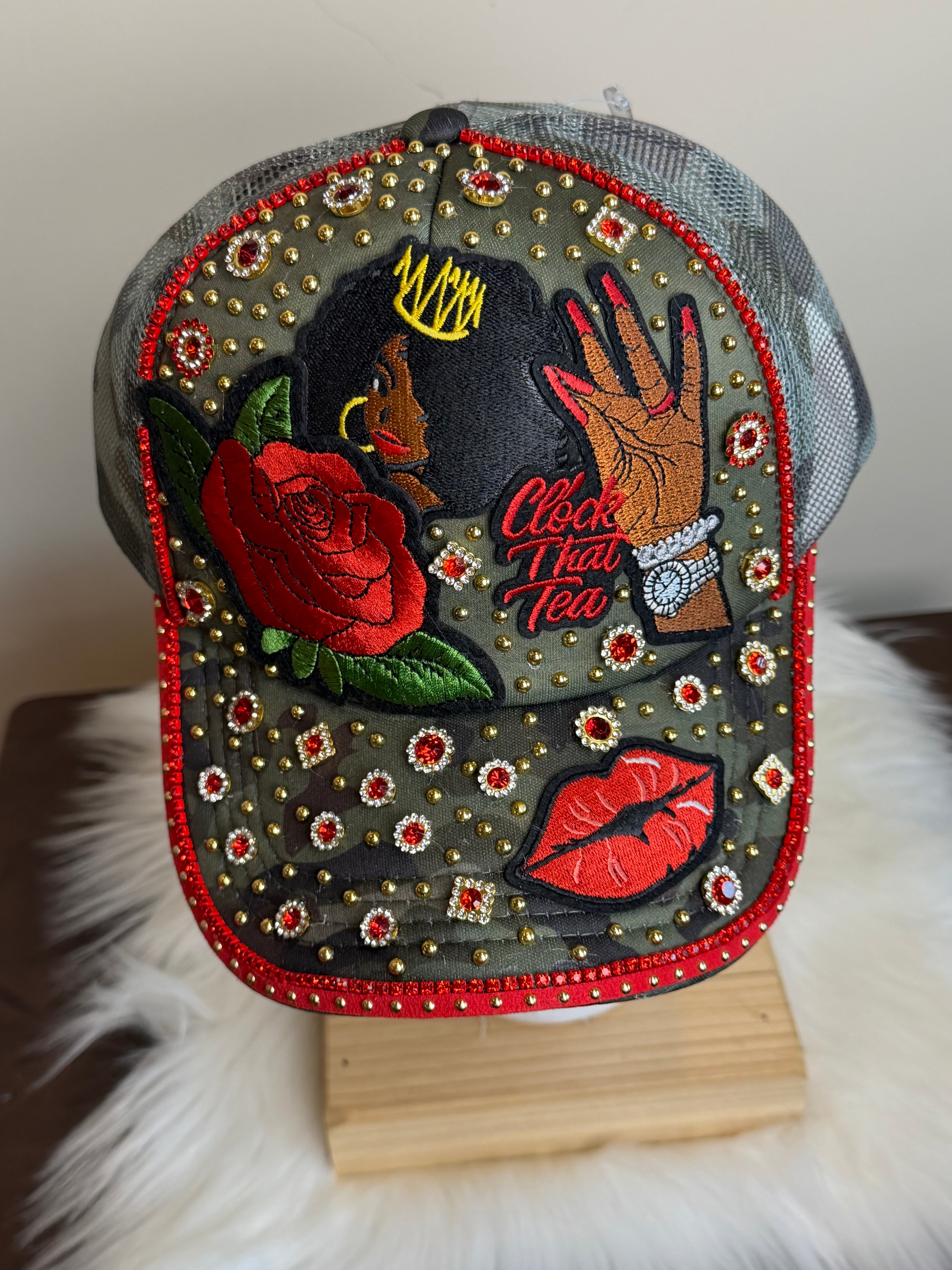 CAMO/RED “CLOCK THAT TEA” JUNK TRUCKER SNAPBACK HAT